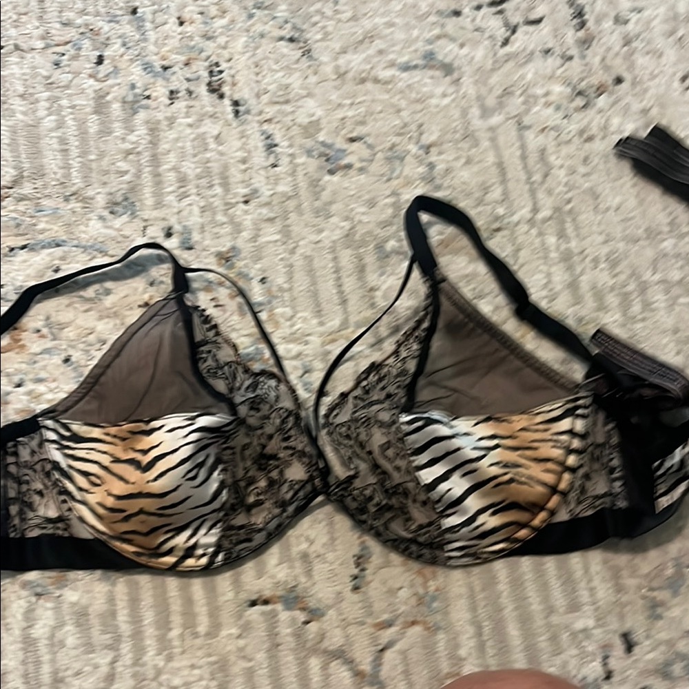 Victoria Secret very sexy plunge Black and Tan Animal Print Bra